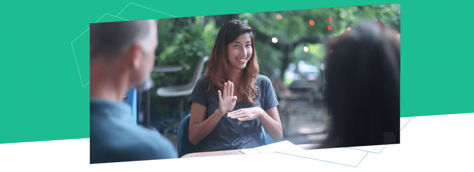 Woman signing "Business"